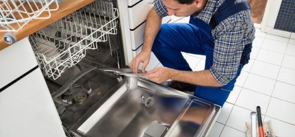 Man Repairing Dishwasher